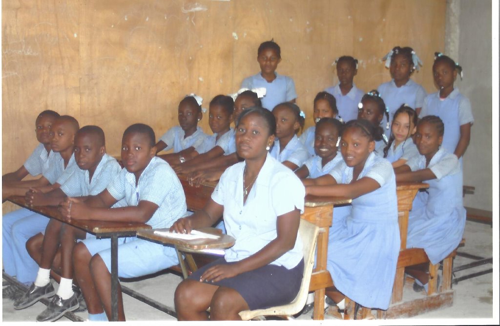 Group of Haitian students and their teacher